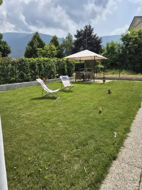 Casa Regina 21 private garden with loungers and mountain views