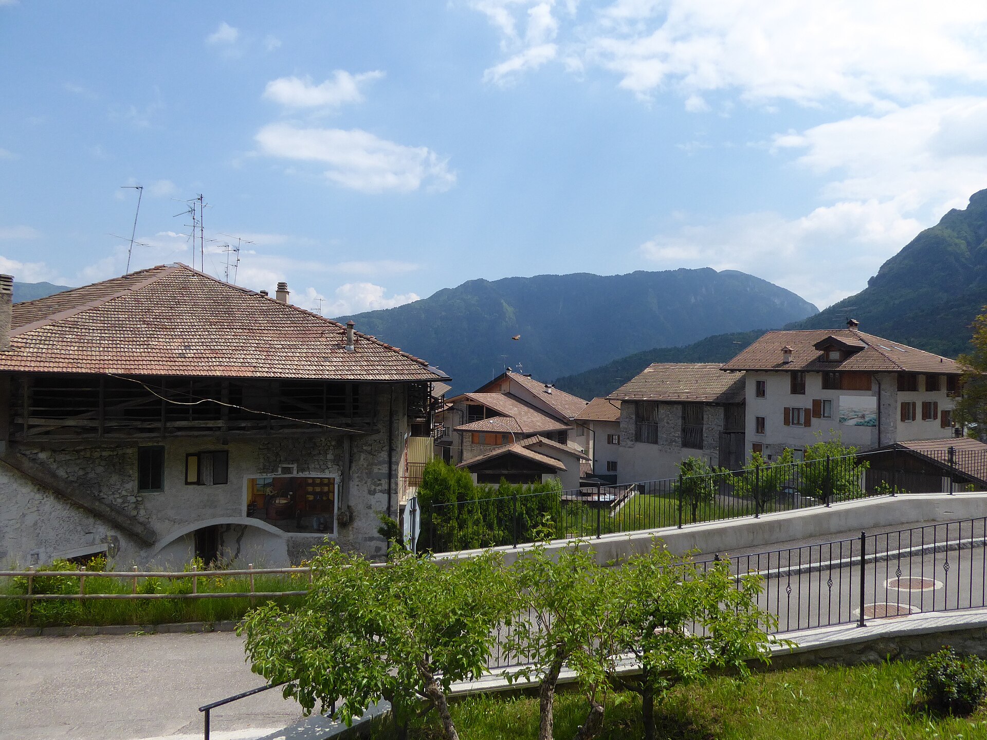 Rural houses and a painted wall in Balbido on the Bleggio plateau
