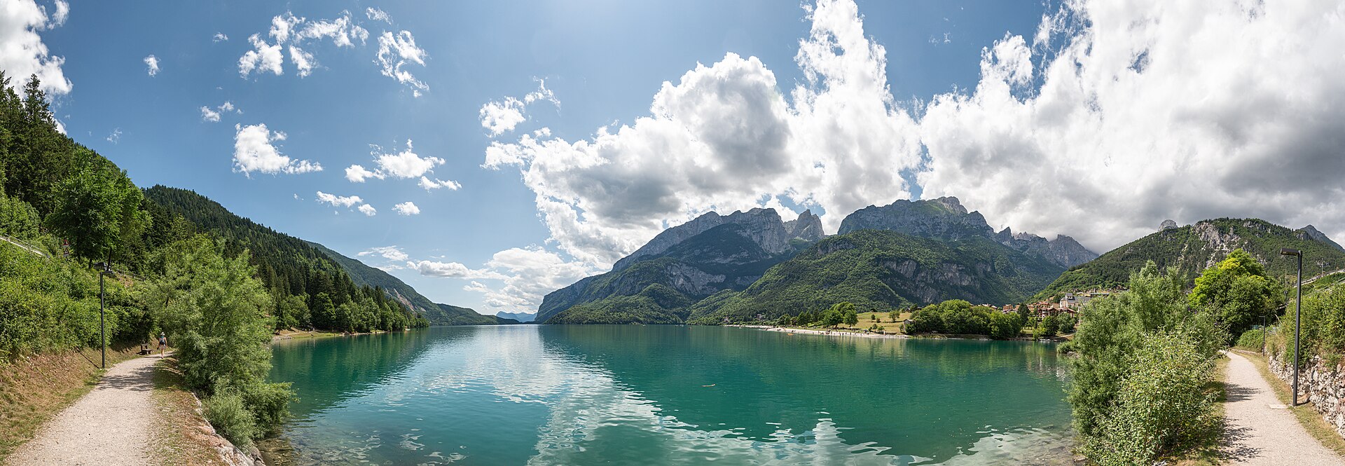 Lake Molveno and the Brenta Dolomites reflected in clear blue-green water